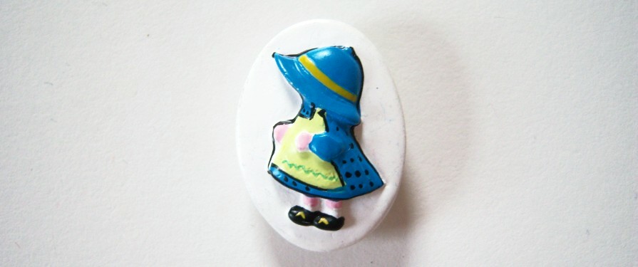 White oval with blue bonnet child 7/8" x 1 1/8" shank back clay button.